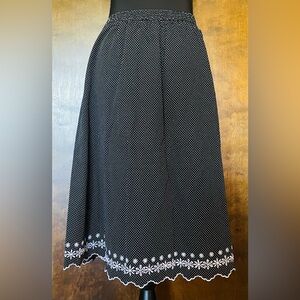 Elegant Black Polka Dot and Floral Skirt